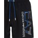 Ea7 Emporio Armani boxer da mare nero con logo blu nella parte anteriore