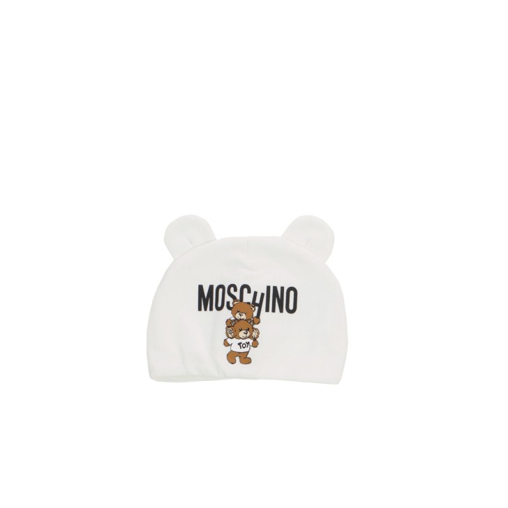 MOSCHINO CAPPELLO BABY UNISEX IN COTONE WHITE CON LOGO LETTERING E TEDDY BEAR